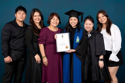 Family-photo-with-degree.jpg